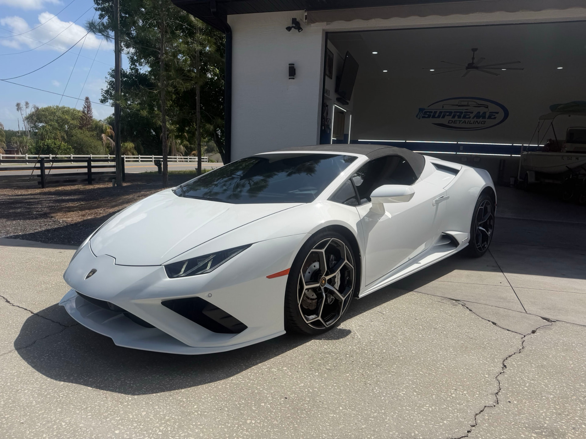 White Lamborghini Huracan front three-quarter after ceramic coating by Supreme Detailing