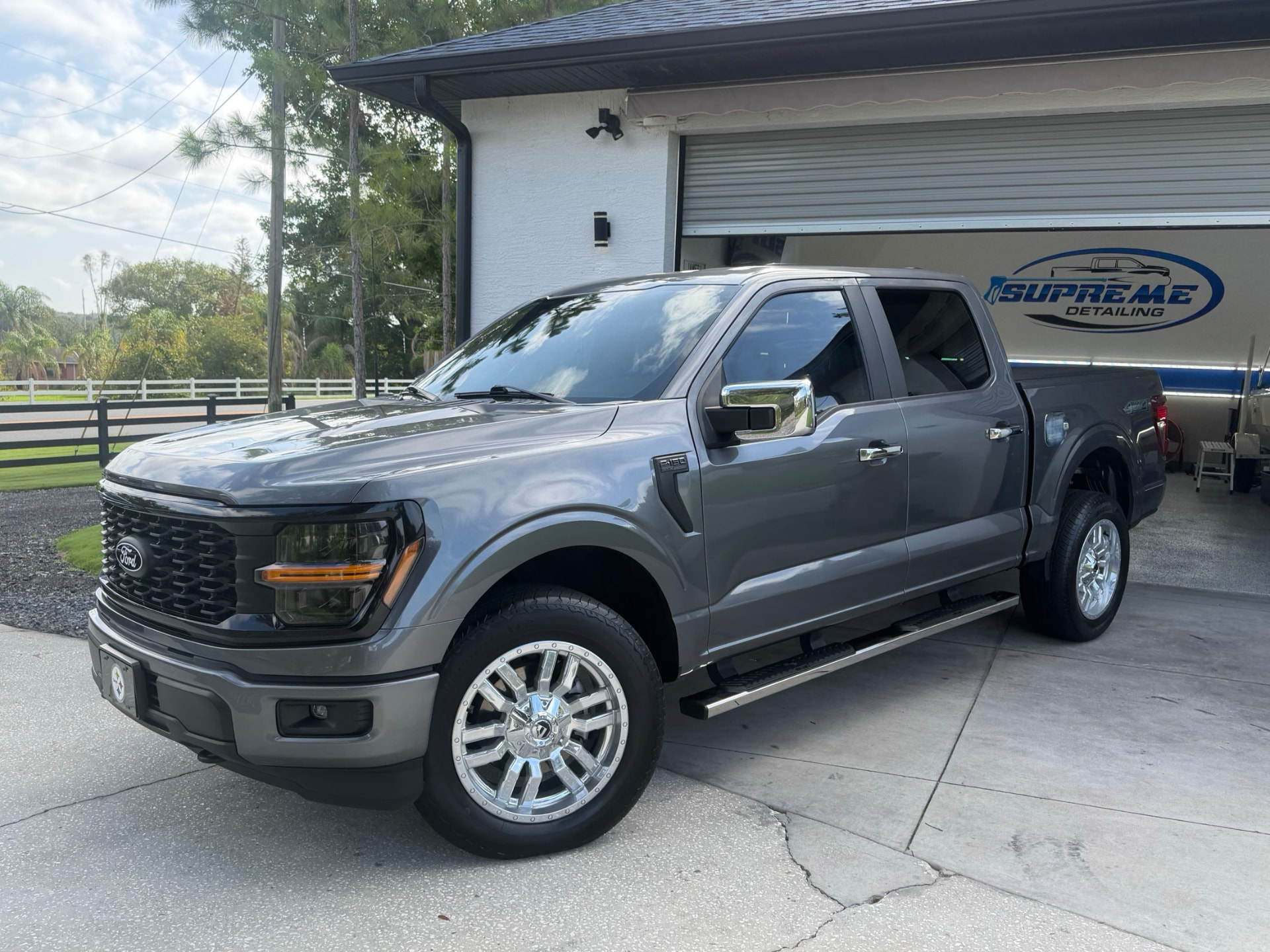 Gray Ford F-150 pickup after paint correction at the Supreme Detailing shop in Clermont
