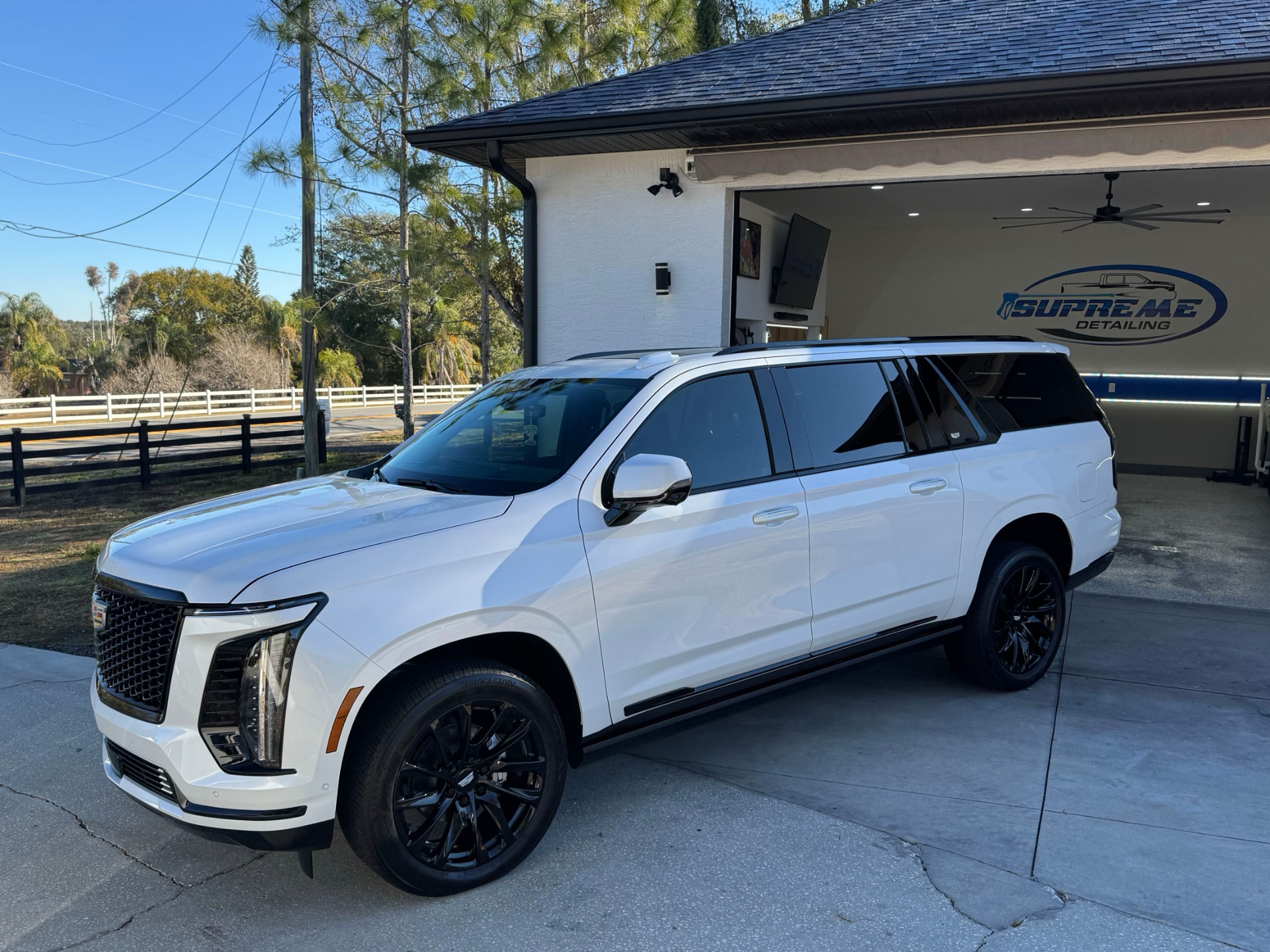 White Cadillac Escalade paint corrected and ceramic coated by Supreme Detailing