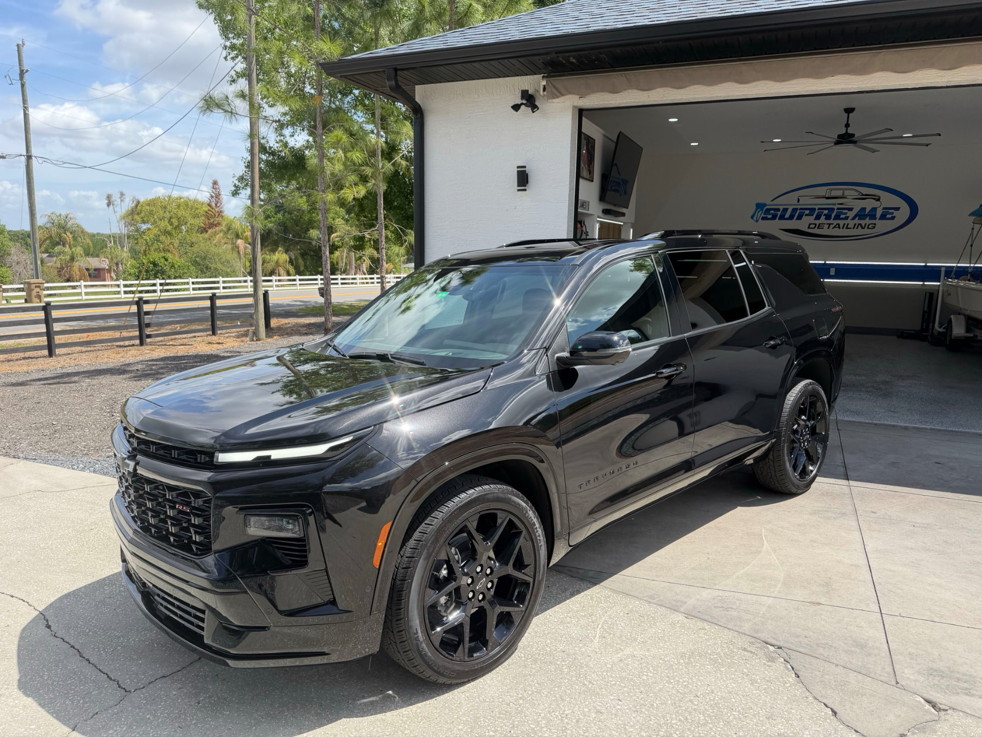 Glossy black Chevrolet Traverse RS ceramic coated by Supreme Detailing