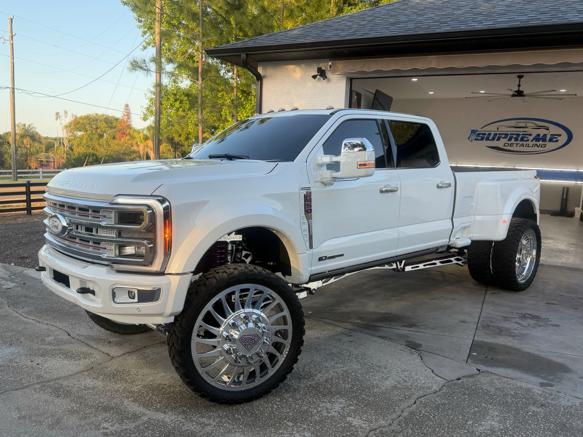Lifted white Ford Super Duty dually detailed and ceramic coated by Supreme Detailing